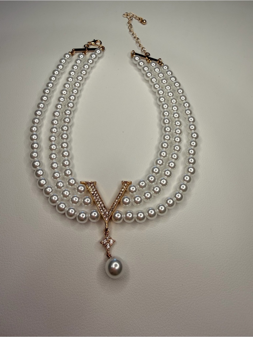 White Pearl Triple-Strand Choker with Gold V Pendant - Picture 8 of 8
